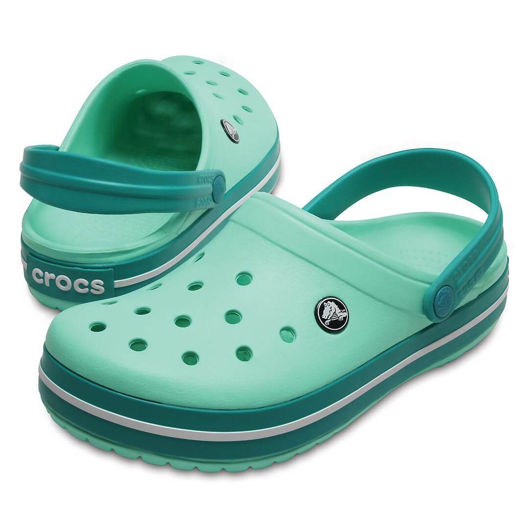 teal green crocs